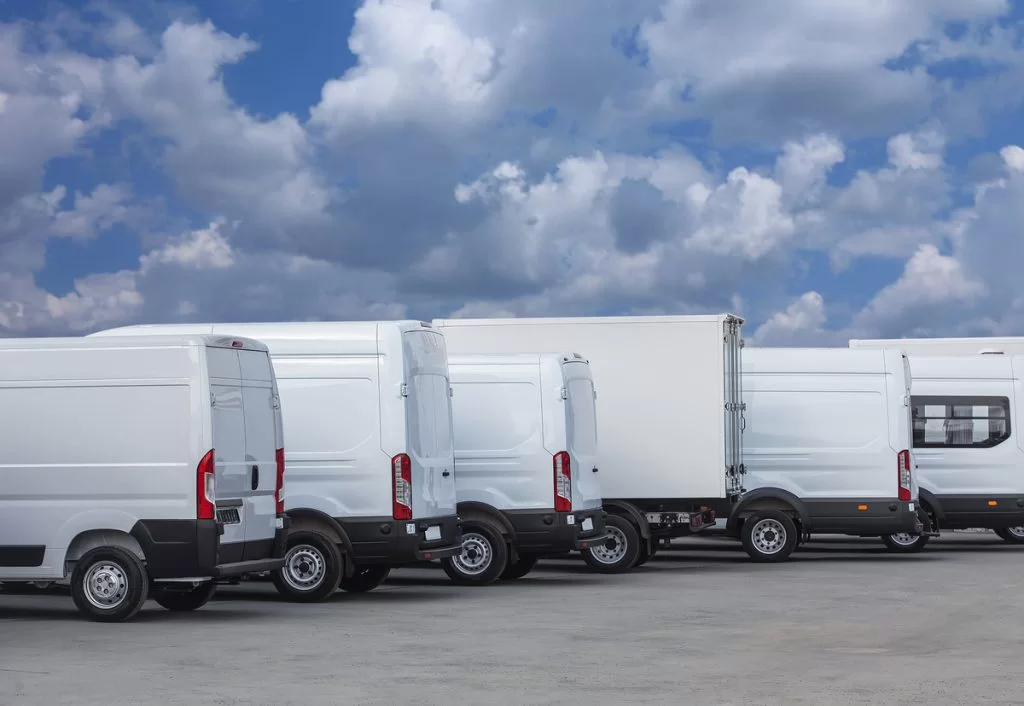Commercial fleet vehicles lined up in a lot
